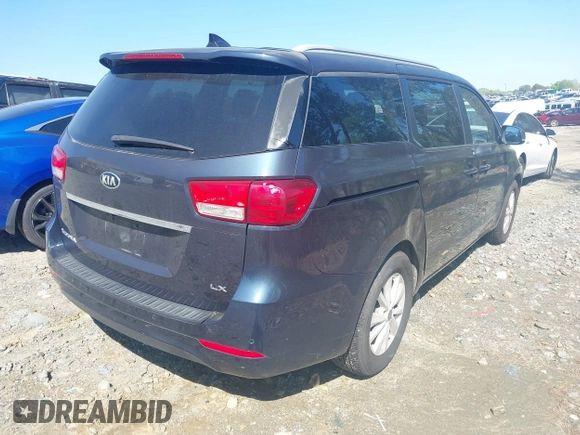 2015 Kia Sedona LX with VIN KNDMB5C14F6036762, listed as a IAAI auction lot 42002812 with 140,518 mi miles. Bid and sale history available at carsss.com. Image 4.