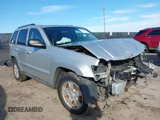 2007 Jeep Grand Cherokee Laredo z VIN 1J8GR48K67C559846, wystawiony jako IAAI lot #41469892 z przebiegiem 208 479 mil mil oraz . Historia ofert i sprzedaży dostępna na DreamBid. Obrazek 1.