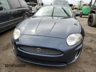 2011 Jaguar XK with VIN SAJWA4GB9BLB41127, listed as a Copart auction lot 75502694 with 0 mi miles and Salvage Title. Bid and sale history available at carsss.com. Image 5.