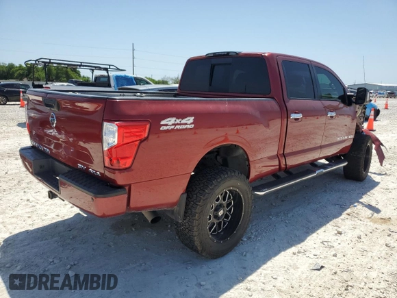 2017 Nissan Titan XD PRO-4X with VIN 1N6BA1F48HN516608, listed as a Copart auction lot 51453465 with 100,767 mi miles and Salvage Title. Bid and sale history available at carsss.com. Image 3.