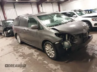 2011 Toyota Sienna LE with VIN 5TDJK3DC2BS013045, listed as a IAAI auction lot 41127037 with 239,401 mi miles. Bid and sale history available at carsss.com. Image 1.