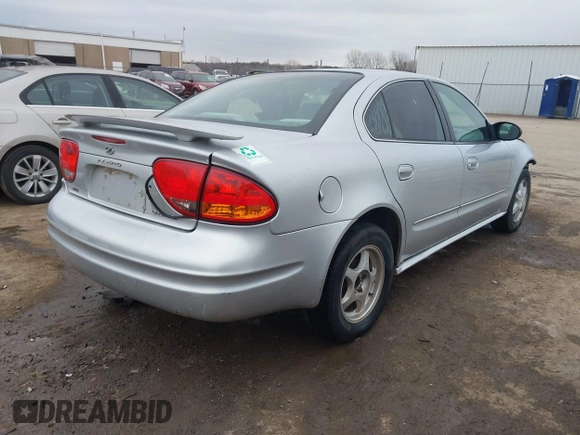 2003 Oldsmobile Alero GL1 z VIN 1G3NL52F43C169291, wystawiony jako IAAI lot #41546681 z przebiegiem 176 341 mil mil oraz . Historia ofert i sprzedaży dostępna na DreamBid. Obrazek 4.