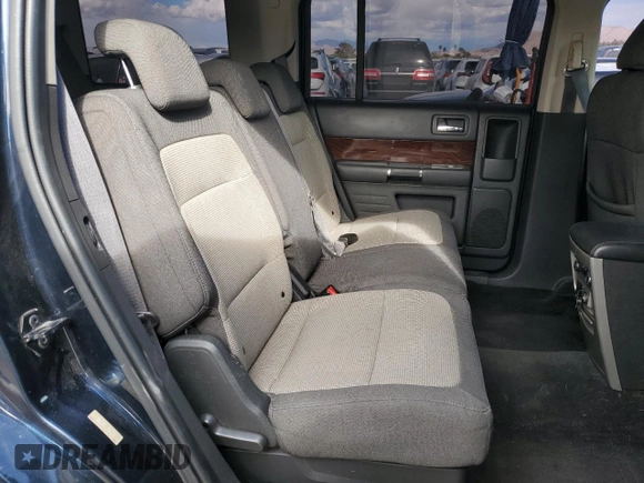 2010 Ford Flex SEL z VIN 2FMGK5CC6ABA24939, wystawiony jako Copart lot #51869795 z przebiegiem 174 987 mil mil oraz Szkoda całkowita • Salvage title. Historia ofert i sprzedaży dostępna na DreamBid. Obrazek 11.