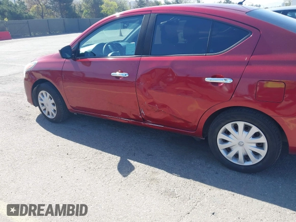 2016 Nissan Versa S with VIN 3N1CN7AP6GL901795, listed as a IAAI auction lot 42019769 with 121,561 mi miles. Bid and sale history available at carsss.com. Image 6.
