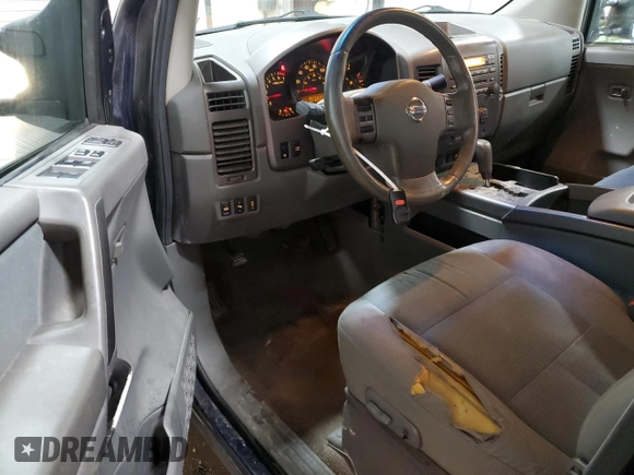 2007 Nissan Titan XE z VIN 1N6BA07A87N220937, wystawiony jako Copart lot #60336605 z przebiegiem 219 286 mil mil oraz Czysty tytuł • Clean title. Historia ofert i sprzedaży dostępna na DreamBid. Obrazek 8.
