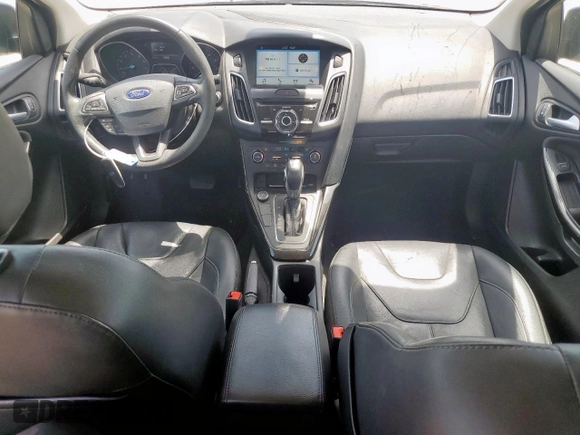 2017 Ford Focus Titanium with VIN 1FADP3J20HL253446, listed as a Copart auction lot 64196895 with 150,633 mi miles and Salvage title. Bid and sale history available at DreamBid. Image 8.