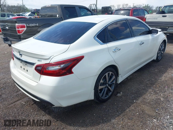 2017 Nissan Altima SV with VIN 1N4AL3AP0HC130420, listed as a IAAI auction lot 42004521 with 144,378 mi miles and . Bid and sale history available at DreamBid. Image 4.