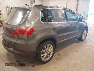 2012 Volkswagen Tiguan SE with VIN WVGBV7AX6CW093750, listed as a IAAI auction lot 42329775 with 117,509 mi miles and . Bid and sale history available at DreamBid. Image 4.