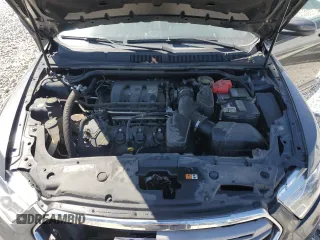 2017 Ford Taurus SEL z VIN 1FAHP2E85HG130308, wystawiony jako Copart lot #56376635 z przebiegiem 123 985 mil mil oraz Czysty tytuł • Clean title. Historia ofert i sprzedaży dostępna na DreamBid. Obrazek 11.