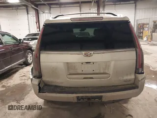 2017 Cadillac Escalade Premium Luxury z VIN 1GYS4CKJ9HR390988, wystawiony jako IAAI lot #41626132 z przebiegiem 166 185 mil mil oraz . Historia ofert i sprzedaży dostępna na DreamBid. Obrazek 17.