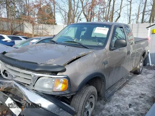 2003 Ford F-150 XL with VIN 2FTRX18W73CB07559, listed as a IAAI auction lot 41452402 with 152,509 mi miles. Bid and sale history available at carsss.com. Image 2.