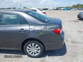 2013 Toyota Corolla L with VIN 2T1BU4EE7DC049698, listed as a IAAI auction lot 41978393 with 48,901 mi miles. Bid and sale history available at carsss.com. Image 12.