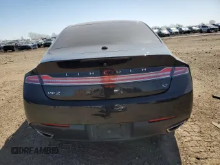 2015 Lincoln MKZ z VIN 3LN6L2GK1FR613074, wystawiony jako Copart lot #52157775 z przebiegiem 118 144 mil mil oraz Szkoda całkowita • Salvage title. Historia ofert i sprzedaży dostępna na DreamBid. Obrazek 6.
