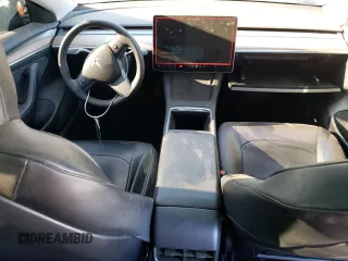 2023 Tesla Model 3 Long Range with VIN 5YJ3E1EB4PF633935, listed as a Copart auction lot 45238705 with 32,972 mi miles and Salvage Title. Bid and sale history available at DreamBid. Image 8.