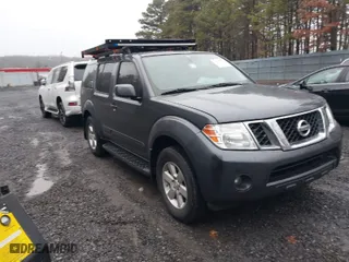2012 Nissan Pathfinder SV with VIN 5N1AR1NBXCC611355, listed as a IAAI auction lot 41517590 with 128,870 mi miles. Bid and sale history available at carsss.com. Image 1.