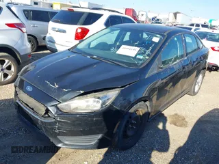 2015 Ford Focus SE with VIN 1FADP3F25FL384068, listed as a IAAI auction lot 40994199 with 1 mi miles. Bid and sale history available at carsss.com. Image 2.