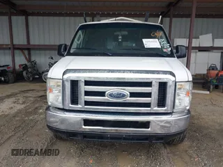 2009 Ford Econoline Cargo with VIN 1FTNE24W99DA34042, listed as a IAAI auction lot 41964410 with 284,031 mi miles and . Bid and sale history available at DreamBid. Image 12.