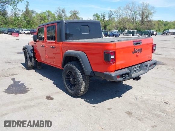 2020 Jeep Gladiator Sport S z VIN 1C6HJTAG0LL149161, wystawiony jako IAAI lot #42071132 z przebiegiem 153 062 mil mil oraz . Historia ofert i sprzedaży dostępna na DreamBid. Obrazek 3.