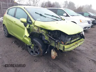 2011 Ford Fiesta SES with VIN 3FADP4FJ8BM107209, listed as a IAAI auction lot 41838522 with 142,730 mi miles. Bid and sale history available at carsss.com. Image 6.