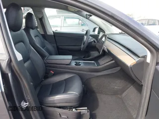 2021 Tesla Model Y Long Range with VIN 5YJYGDEE6MF209034, listed as a IAAI auction lot 41896238 with 53,401 mi miles. Bid and sale history available at carsss.com. Image 5.