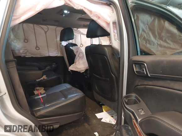 2016 Chevrolet Tahoe LTZ with VIN 1GNSKCKCXGR477284, listed as a IAAI auction lot 42221589 with Not provided miles and . Bid and sale history available at DreamBid. Image 8.