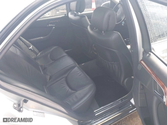2005 Mercedes-Benz S-Class 5.0L with VIN WDBNG84J55A458443, listed as a IAAI auction lot 41804975 with 180,101 mi miles. Bid and sale history available at carsss.com. Image 8.