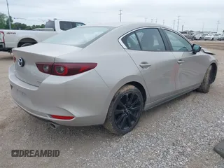 2025 Mazda 3 S Select Sport with VIN JM1BPABM5S1762571, listed as a IAAI auction lot 42186857 with 12,189 mi miles and . Bid and sale history available at DreamBid. Image 4.