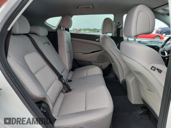 2018 Hyundai Tucson SEL Plus z VIN KM8J33A41JU670631, wystawiony jako Copart lot #59887105 z przebiegiem 133 012 mil mil oraz Szkoda całkowita • Salvage title. Historia ofert i sprzedaży dostępna na DreamBid. Obrazek 11.