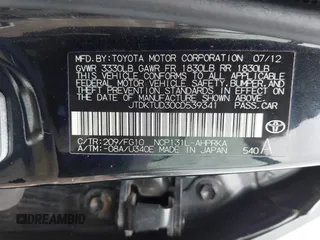 2012 Toyota Yaris L with VIN JTDKTUD30CD539341, listed as a IAAI auction lot 41981342 with 210,253 mi miles. Bid and sale history available at carsss.com. Image 9.