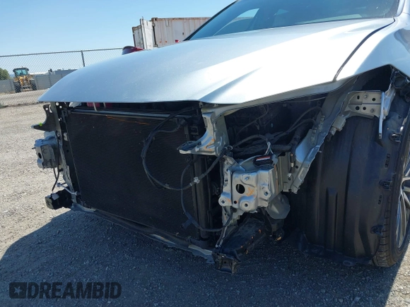 2022 Lexus ES 300h with VIN 58ADA1C12NU017850, listed as a IAAI auction lot 42439875 with 49,634 mi miles and . Bid and sale history available at DreamBid. Image 6.