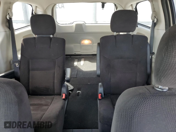2014 Dodge Grand Caravan SXT z VIN 2C4RDGCG8ER266814, wystawiony jako Copart lot #52053155 z przebiegiem 279 551 mil mil oraz Tytuł czysty. Historia ofert i sprzedaży dostępna na DreamBid. Obrazek 10.