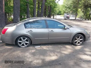 2006 Nissan Maxima SE z VIN 1N4BA41E06C848920, wystawiony jako IAAI lot #42116739 z przebiegiem 156 589 mil mil oraz . Historia ofert i sprzedaży dostępna na DreamBid. Obrazek 13.