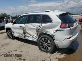2019 Jeep Cherokee Overland with VIN 1C4PJMJN3KD123879, listed as a Copart auction lot 57650905 with 77,962 mi miles and Salvage title. Bid and sale history available at DreamBid. Image 2.