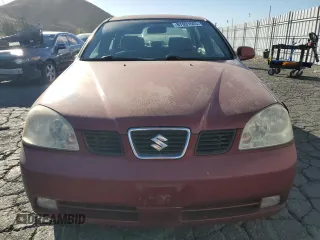2005 Suzuki Forenza Premium z VIN KL5JJ56Z65K093127, wystawiony jako Copart lot #87691665 z przebiegiem 178 868 mil mil oraz Szkody całkowita. Historia ofert i sprzedaży dostępna na DreamBid. Obrazek 5.