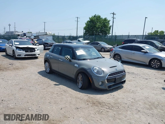 2019 MINI Hardtop 4 Door Cooper S with VIN WMWXU3C57K2H54547, listed as a IAAI auction lot 42492037 with 74,657 mi miles and . Bid and sale history available at DreamBid. Image 1.