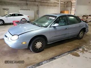 1997 Ford Taurus LX with VIN 1FALP53S8VA114239, listed as a Copart auction lot 56534025 with 110,834 mi miles and Salvage title. Bid and sale history available at DreamBid. Image 1.