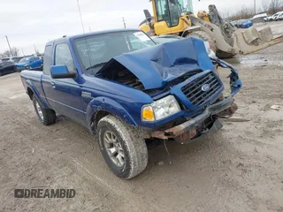 2009 Ford Ranger XLT with VIN 1FTZR45E99PA02617, listed as a IAAI auction lot 41508620 with 127,331 mi miles. Bid and sale history available at carsss.com. Image 1.