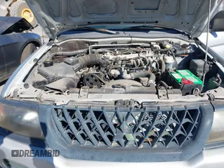 2003 Mitsubishi Montero Sport ES with VIN JA4LS21H13J011931, listed as a IAAI auction lot 41847642 with 113,559 mi miles. Bid and sale history available at carsss.com. Image 10.