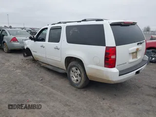 2012 Chevrolet Suburban LT with VIN 1GNSCJE08CR303761, listed as a IAAI auction lot 41738725 with 387,981 mi miles and . Bid and sale history available at DreamBid. Image 3.