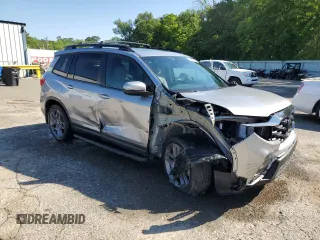 2022 Honda Passport EX-L z VIN 5FNYF7H59NB003482, wystawiony jako Copart lot #55460425 z przebiegiem 32 321 mil mil oraz Szkody całkowita. Historia ofert i sprzedaży dostępna na DreamBid. Obrazek 4.