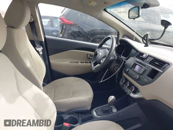 2013 Kia Rio LX with VIN KNADM4A30D6202570, listed as a IAAI auction lot 41215769 with Not Provided miles and . Bid and sale history available at DreamBid. Image 5.