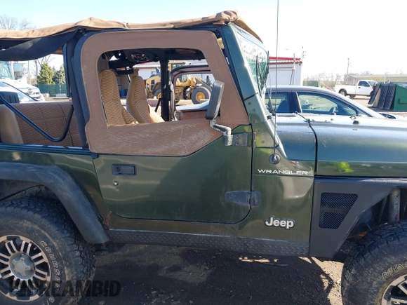 1998 Jeep Wrangler SE with VIN 1J4FY29P6WP709203, listed as a IAAI auction lot 41962877 with 1 mi miles. Bid and sale history available at carsss.com. Image 12.