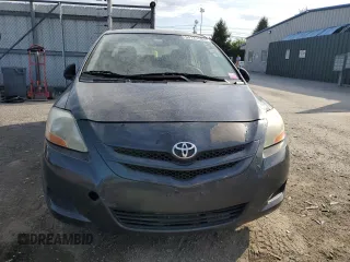 2007 Toyota Yaris with VIN JTDBT903571184936, listed as a Copart auction lot 54127585 with 115,908 mi miles and Clean Title. Bid and sale history available at carsss.com. Image 5.