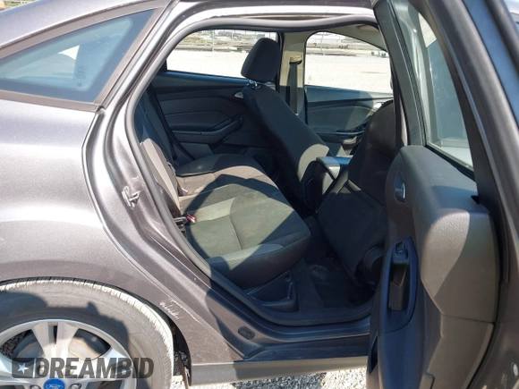 2013 Ford Focus SE with VIN 1FADP3F24DL269491, listed as a IAAI auction lot 42693397 with 304,906 mi miles and . Bid and sale history available at DreamBid. Image 8.