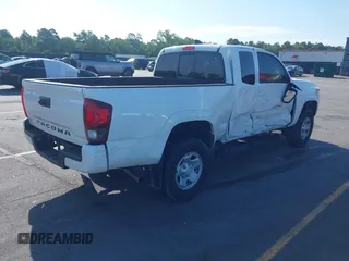 2021 Toyota Tacoma SR with VIN 3TYRX5GN4MT009048, listed as a IAAI auction lot 42291313 with 26,197 mi miles and . Bid and sale history available at DreamBid. Image 4.