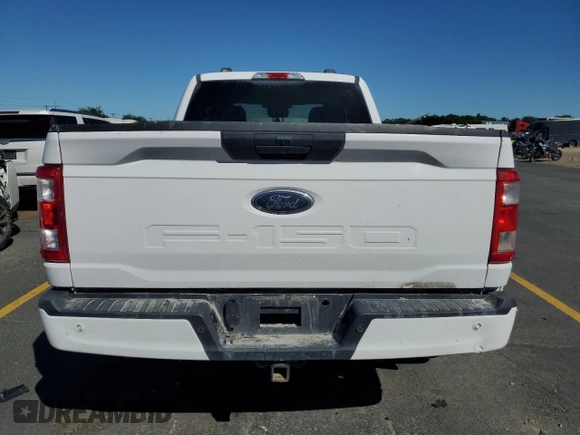 2021 Ford F-150 XL with VIN 1FTFX1E56MKD34057, listed as a Copart auction lot 63997585 with 99,679 mi miles and Clean title. Bid and sale history available at DreamBid. Image 6.
