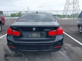 2015 BMW 3 Series 320i with VIN WBA3B1G57FNT05826, listed as a IAAI auction lot 42103193 with 128,800 mi miles. Bid and sale history available at carsss.com. Image 15.