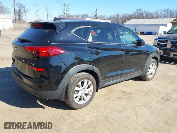 2019 Hyundai Tucson SE with VIN KM8J2CA46KU073107, listed as a IAAI auction lot 41648453 with 58,417 mi miles. Bid and sale history available at carsss.com. Image 4.