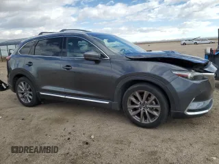 2021 Mazda CX-9 Grand Touring with VIN JM3TCBDY7M0536781, listed as a Copart auction lot 55862725 with 62,131 mi miles and Salvage title. Bid and sale history available at DreamBid. Image 4.
