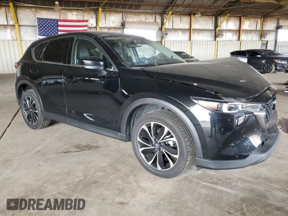 2023 Mazda CX-5 2.5 S Premium Plus Package with VIN JM3KFBEM2P0217307, listed as a Copart auction lot 44818595 with 64,219 mi miles and Salvage Title. Bid and sale history available at carsss.com. Image 4.